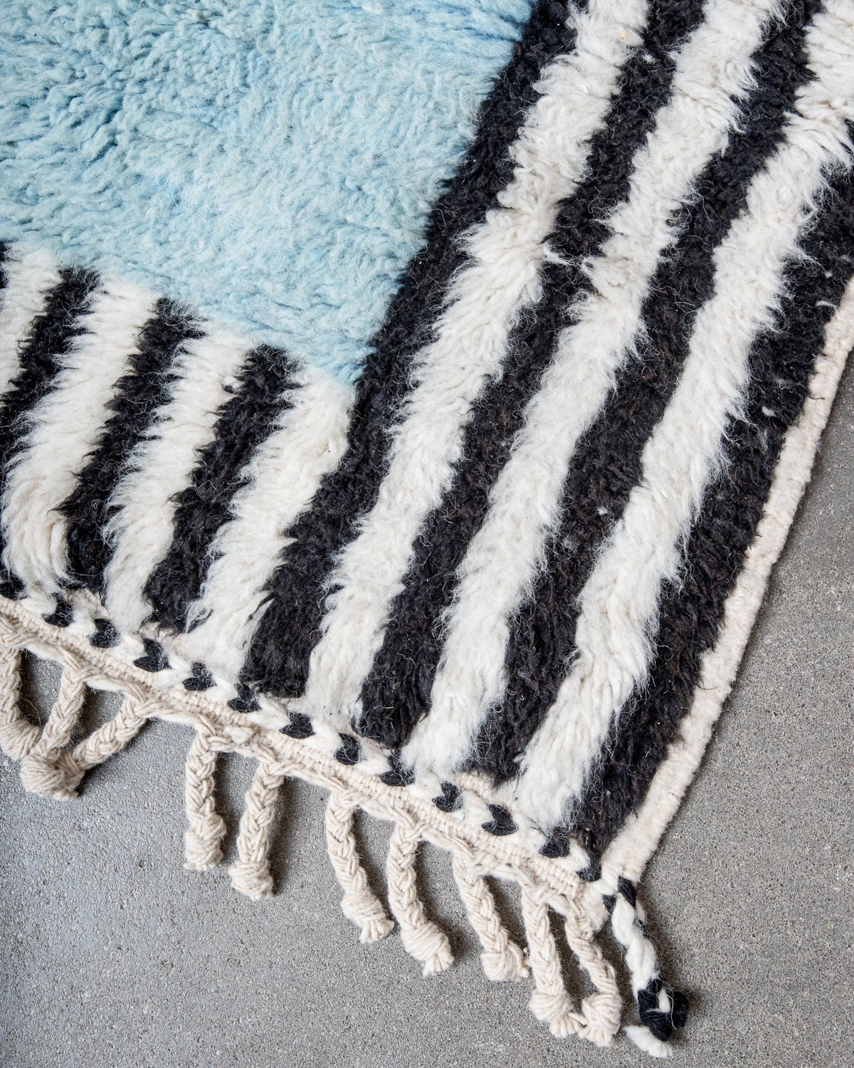 Modern, designer, handcrafted Berber rug from Morocco. Beniourain carpet with beautiful colours and patterns and fluffy wool texture.